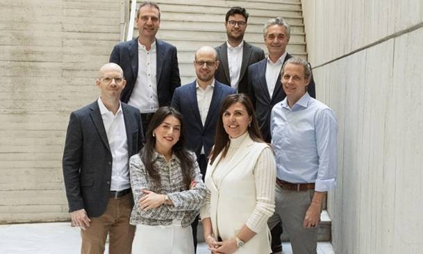 The teams from Optimus Energy and Enspired sign the contract in Athens