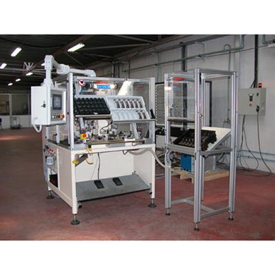 Half-automatic machine for sensor welding and controls