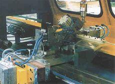 High-Speed profile cut-off machine with synchronous linear motor